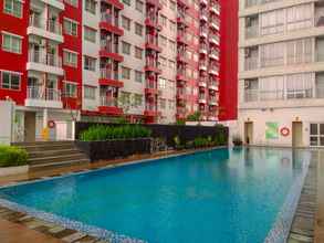 Swimming Pool 4 Cozy Studio at Taman Melati Margonda Apartment By Travelio