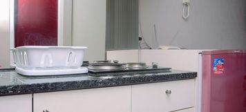 Common Space 2 Cozy Studio at Taman Melati Margonda Apartment By Travelio