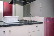 Common Space Cozy Studio at Taman Melati Margonda Apartment By Travelio