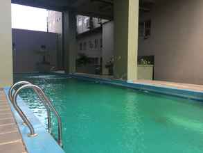 Swimming Pool 4 Comfy and Stylish 2BR at Grand Asia Afrika Apartment By Travelio