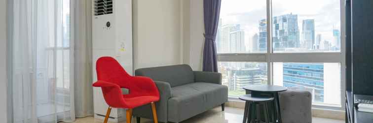 Lobi Stylish and Modern 2BR at The Empyreal Apartment By Travelio