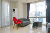 Lobi Stylish and Modern 2BR at The Empyreal Apartment By Travelio