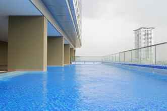 Swimming Pool 4 Spacious 1BR at Praxis Apartment By Travelio