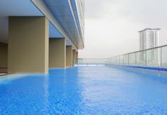 Kolam Renang 4 Spacious 1BR at Praxis Apartment By Travelio