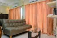 Lobby 2BR with Good Location at City Home MOI Apartment By Travelio
