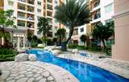 Swimming Pool 5 2BR with Good Location at City Home MOI Apartment By Travelio