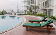 Swimming Pool 2 Fully Furnished Studio at Majestic Point Serpong Apartment By Travelio