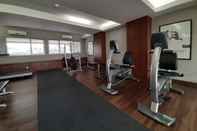 Fitness Center Modern Design 2BR at Bintaro Park View Apartment By Travelio