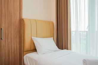 Kamar Tidur 4 Beautiful and Comfy 2BR at Tree Park Apartment By Travelio