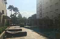 Swimming Pool Cozy and Chic 2BR Apartment at Pinewood Jatinangor near JATOS By Travelio