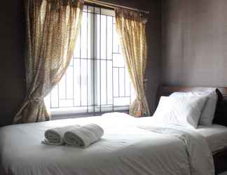 Bedroom 2 Cozy and Chic 2BR Apartment at Pinewood Jatinangor near JATOS By Travelio