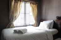 Bedroom Cozy and Chic 2BR Apartment at Pinewood Jatinangor near JATOS By Travelio