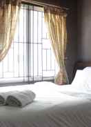 BEDROOM Cozy and Chic 2BR Apartment at Pinewood Jatinangor near JATOS By Travelio