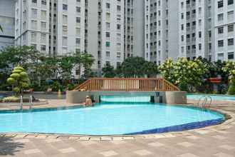 Kolam Renang 4 2BR with Direct Access to Pool at Green Bay Apartment By Travelio