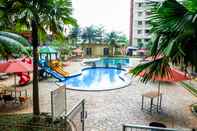 Swimming Pool Cozy Living 1BR Kebagusan City Apartment By Travelio