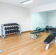 Fitness Center 5 Relaxing and Comfy Studio at Tifolia Apartment By Travelio