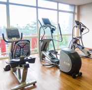 Fitness Center 4 Relaxing and Comfy Studio at Tifolia Apartment By Travelio