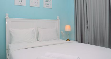 침실 2 Relaxing and Comfy Studio at Tifolia Apartment By Travelio