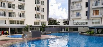 Swimming Pool 2 Modern Studio at Casa de Parco Apartment By Travelio