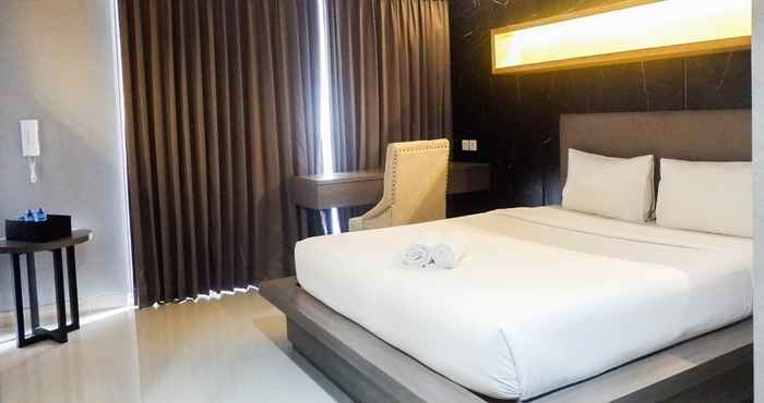 Bedroom Modern and Spacious Studio Apartment at Taman Melati By Travelio