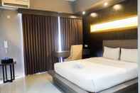 Kamar Tidur Modern and Spacious Studio Apartment at Taman Melati By Travelio