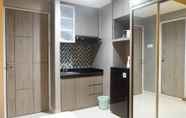 Kamar Tidur 3 Modern and Spacious Studio Apartment at Taman Melati By Travelio