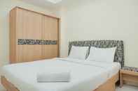 Bedroom Homey 2BR Apartment at Belmont Residence By Travelio