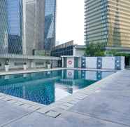 Swimming Pool 3 Beautiful and Comfortable 2BR at The Empyreal Apartment By Travelio