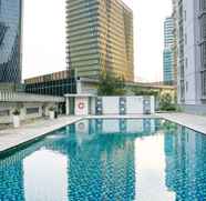 Swimming Pool 2 Beautiful and Comfortable 2BR at The Empyreal Apartment By Travelio