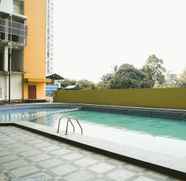 Swimming Pool 3 Cozy Living 2BR at Apartment Pancoran Riverside By Travelio