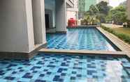 Kolam Renang 2 Beautiful 2BR Apartment at Royal Olive Residence By Travelio