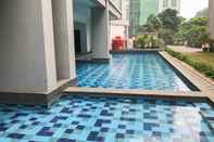 Kolam Renang Beautiful 2BR Apartment at Royal Olive Residence By Travelio