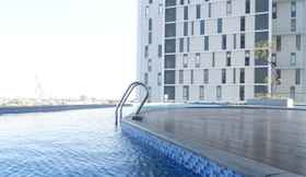 Swimming Pool 2 Premium 2BR at The Linden Apartment near Marvell City Mall By Travelio