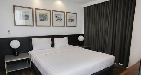 Bedroom 2 Premium 2BR at The Linden Apartment near Marvell City Mall By Travelio