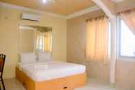 Bedroom Cozy and Relax 1BR Mediterania Gajah Mada Apartment By Travelio