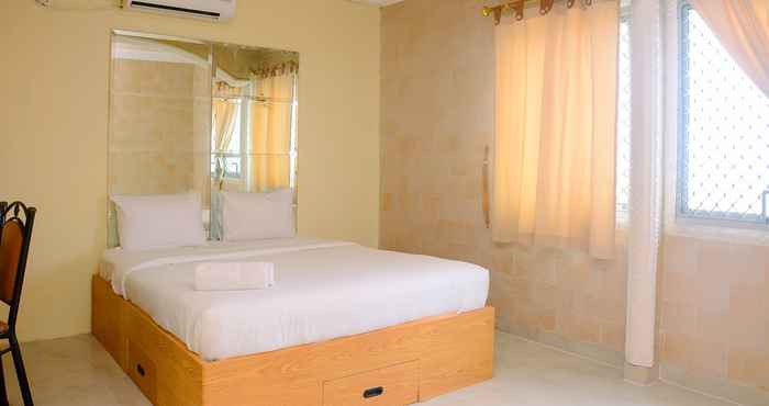 Kamar Tidur Cozy and Relax 1BR Mediterania Gajah Mada Apartment By Travelio