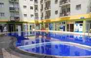 Kolam Renang 5 Relaxing and Pleasant 2BR Apartment at The Suites Metro Bandung By Travelio