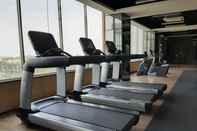 Fitness Center Cozy and Chic Springwood Residence Studio Apartment By Travelio