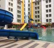 Swimming Pool 4 Comfy Studio with Modern Design Apartment at Paramount Skyline By Travelio