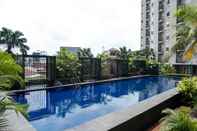 Kolam Renang Fully Furnished Modern Minimalist 2BR Apartment at Puri Park View By Travelio