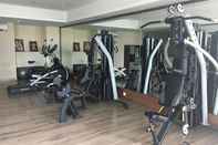 Fitness Center Homey and Pleasant 2BR Apartment at Tamansari La Grande By Travelio