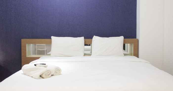 ห้องนอน Pleasant Studio Room with Private Kitchen Apartment at Emerald Towers By Travelio