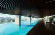 Swimming Pool 5 Luxurious 2BR Apartment with Private Lift at Menteng Park By Travelio