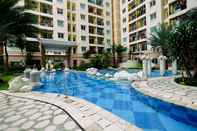 Swimming Pool Great Choice 2BR near MOI at City Home Apartment By Travelio