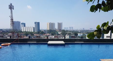 Lobby 2 Modern Studio at Tree Park Cikokol Apartment By Travelio
