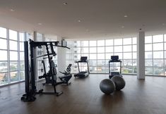 Fitness Center 5 Modern Studio at Tree Park Cikokol Apartment By Travelio