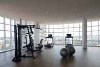 Fitness Center Modern Studio at Tree Park Cikokol Apartment By Travelio