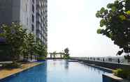 Swimming Pool 6 Modern Studio at Tree Park Cikokol Apartment By Travelio