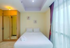 Bedroom 2 Exclusive with City View 3BR at Bellagio Residence Apartment By Travelio