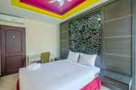 Bedroom Exclusive with City View 3BR at Bellagio Residence Apartment By Travelio